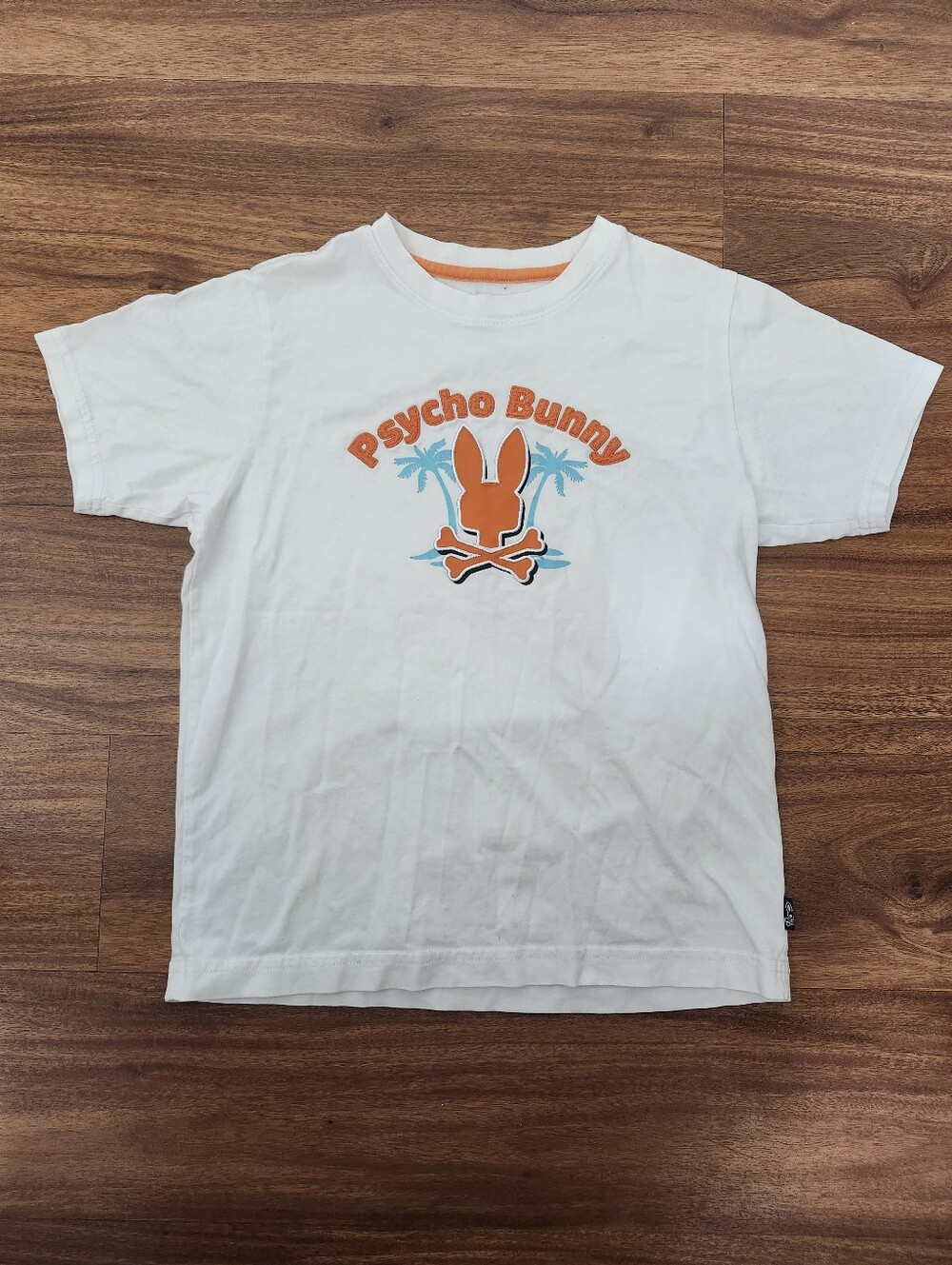 Psycho Bunny White Tee with Orange & Blue Graphic